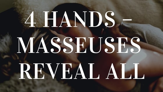 Two-massage-therapists-kissing-on-a-bed